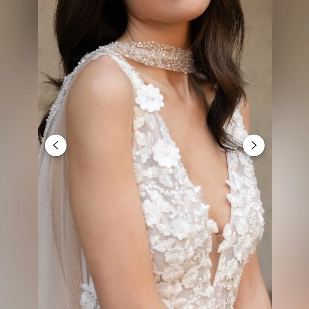 Elegant Ivory Beaded Bridal Cape with Floral Details - Picture 3 of 9